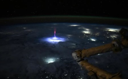 NASA Astronaut Captures Rare Red Sprite Over Storm from Space Station